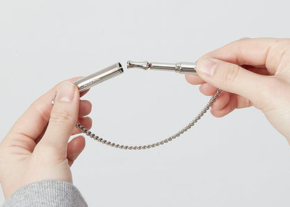 ACME original 'silent' dog training whistle no. 535. Adjustable frequency. Instruction leaflet included. Made in the UK. Good sound quality. Weather-proof. Solid brass with nickel plated finish